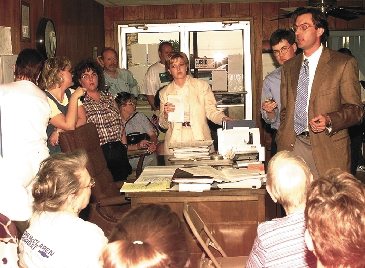 Brad Newsom (right, standing) pictured at a press conferencel in 2001. — Lone Star Iconoclast Photo